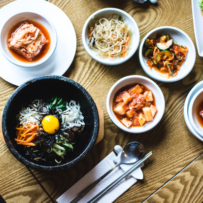 Korean bibimbap with side dishes.